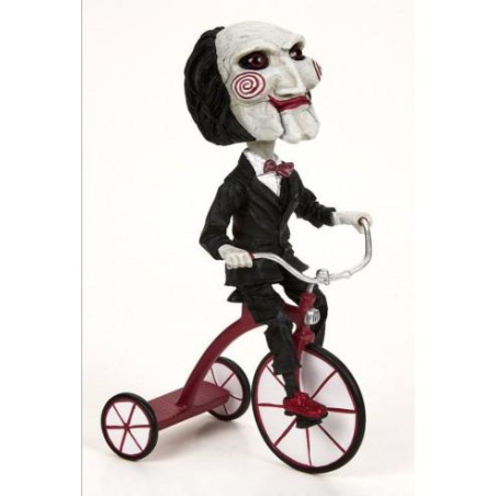 HEAD KNOCKER PUPPET ON TRICYCLE FIG 20 CM SAW RE